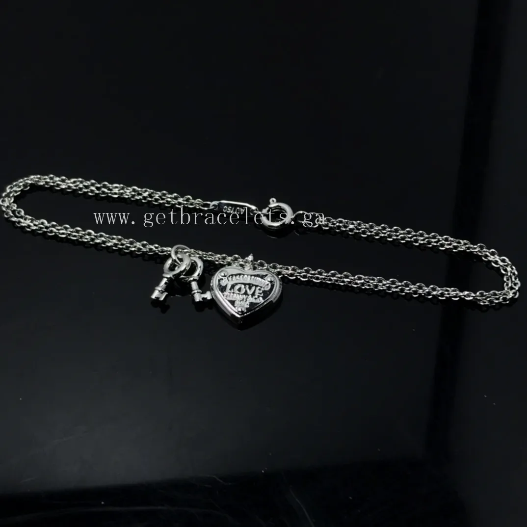 Return to Tiffany Love Heart Tag Key Bracelet in Silver/Rose Gold