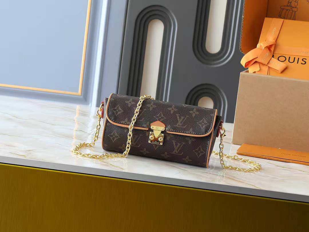 Louis Vuitton Pochette Camille Handbag